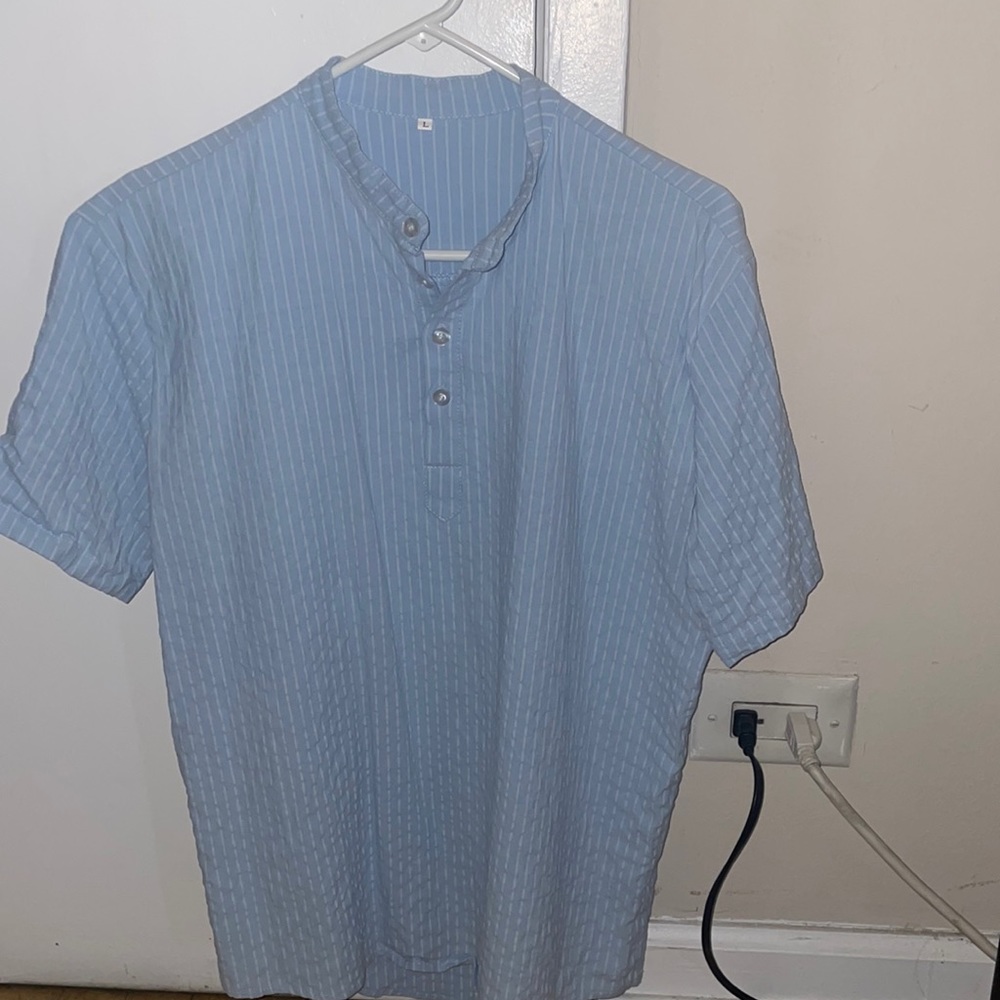 White and blue stripped short sleeve quarter button down. Large